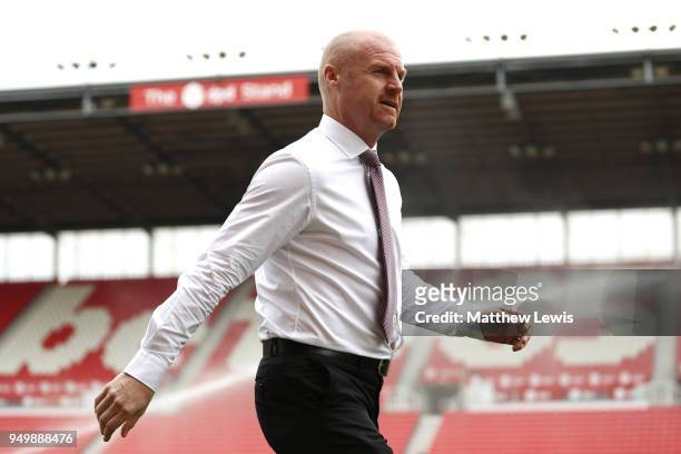 Sean Dyche, Manager of Burnley inspects the pitch ahead of the Premier League match between Stoke City and Burnley at Bet365 Stadium on April 22,...