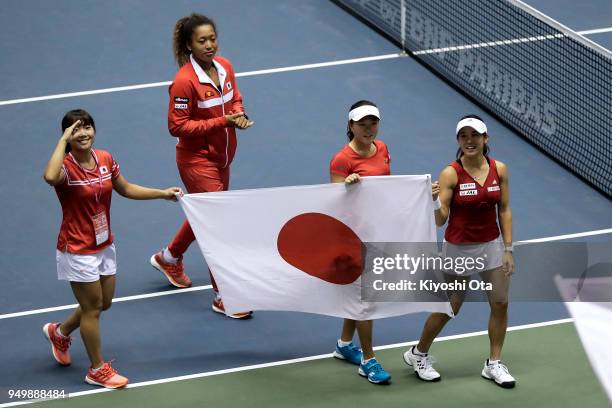 Members of the Japan Fed Cup team Kurumi Nara, Naomi Osaka, Makoto Ninomiya and Miyu Kato celebrate the team's 3-2 victory against Great Britain...