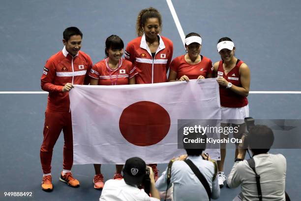 Members of the Japan Fed Cup team team captain Toshihisa Tsuchihashi, Kurumi Nara, Naomi Osaka, Makoto Ninomiya and Miyu Kato pose for photographs as...