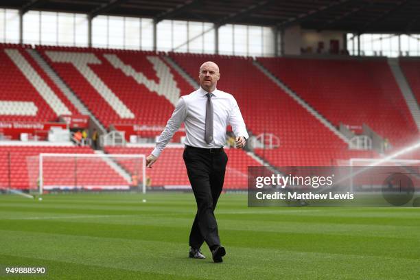 Sean Dyche, Manager of Burnley inspects the pitch ahead of the Premier League match between Stoke City and Burnley at Bet365 Stadium on April 22,...