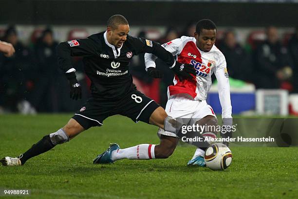 Ibrahima Traore of Augsburg battles for the ball with Sidney Sam of Kaiserslautern during the Second Bundesliga match between FC Augsburg and 1. FC...