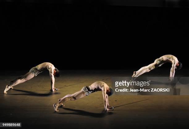 Pavel Trush, Yang Jiang and Simon Feltz of the Ballet of Opera of Lyon during Petite Mort , a contemporary dance piece created in 1991 by Jiri...