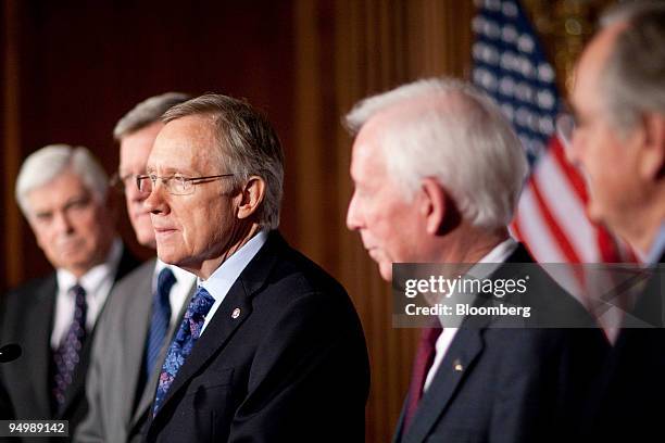 Senator Christopher Dodd, a Democrat from Connecticut, left to right, Senator Max Baucus, a Democrat from Montana, Senate Majority Leader Harry Reid,...