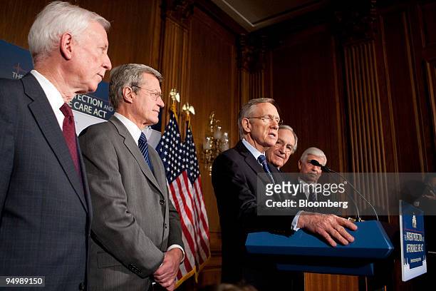 Cecil Wilson, president-elect of the American Medical Association, left to right, Senator Max Baucus, a Democrat from Montana, Senate Majority Leader...