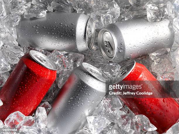 beverage cans on ice - soft drink stock pictures, royalty-free photos & images