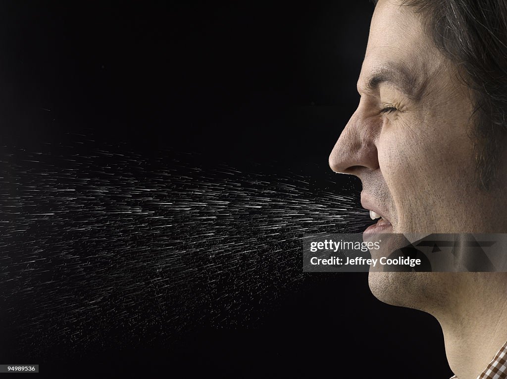 Man Sneezing