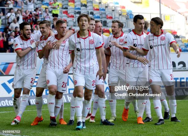 Rouwen Hennings of Duesseldorf celebrates the first goal with his team mates during the Second Bundesliga match between Fortuna Duesseldorf and FC...