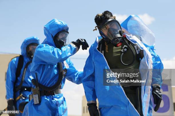 And Jordanian soldiers participate in a chemical attack simulator to deal with any possible chemical attack during Eager Lion exercise at the...