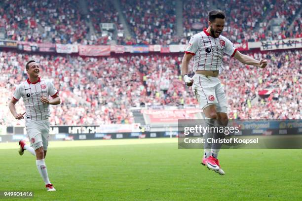 Niko Giesselmann of Duesseldorf celebrates the second goal with Julian Schauerte of Duesseldorf during the Second Bundesliga match between Fortuna...