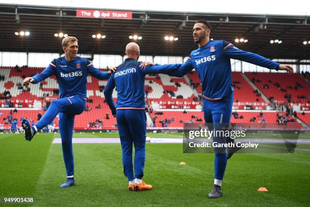 Darren Fletcher, Stephen Ireland and Geoff Cameron of Stoke City warm up prior to the Premier League match between Stoke City and Burnley at Bet365...