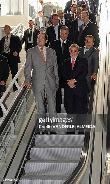 Brazilian President Luiz Inacio Lula da Silva , goes down the escalators during the inauguration of the subway line that links Ipanema beach with the...