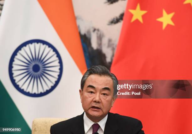 Chinese Forein Minister Wang Yi speaks during a press conference with Indian Foreign Minister Sushma Swaraj at the Diaoyutai State Guest House in...