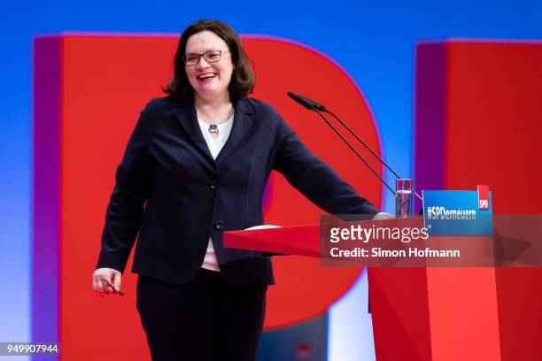 Andrea Nahles, currently Bundestag faction leader of the German Social Democrats , smiles as she speaks at an SPD federal party congress on April 22,...