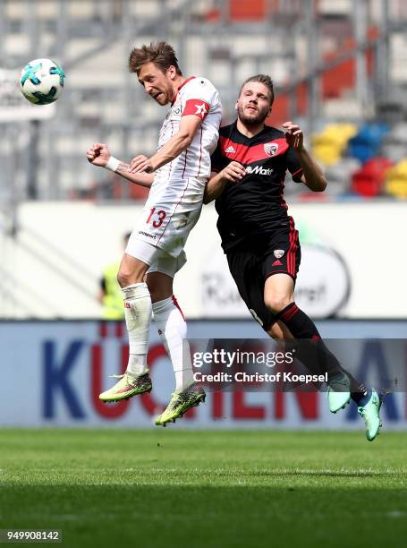Adam Bodzek of Duesseldorf and Robert Leipertz of Ingolstadt go up for a header during the Second Bundesliga match between Fortuna Duesseldorf and FC...