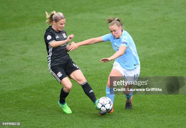 Eugenie Le Sommer of Lyon and Georgia Stanway of Manchester City Women battle for possession during the UEFA Women's Champions League Semi Final,...