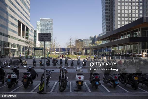 Motorbikes sit parked in the Zuidas financial district in Amsterdam, Netherlands, on Friday, April. 20, 2018. Brexit will lead as many as 30...