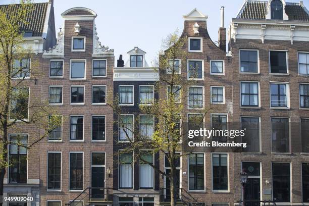 Houses stand beside the Keizersgracht canal in Amsterdam, Netherlands, on Friday, April. 20, 2018. Brexit will lead as many as 30 significant...