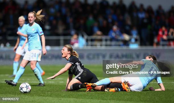 Manchester City Womens' Jill Scott fouls Lyon's Amandine Henry during the UEFA Women's Champions League, Semi Final First Leg match at the City...
