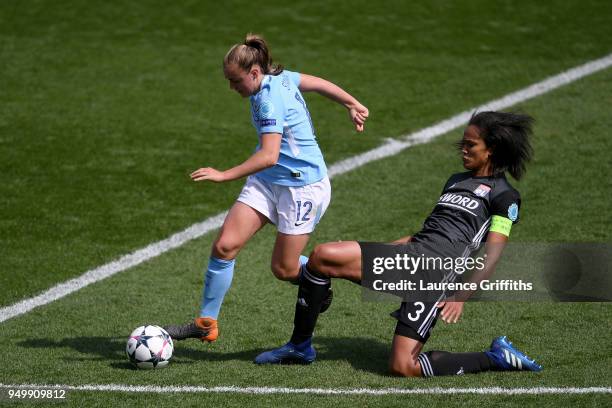 Wendie Renard of Lyon tackles Georgia Stanway of Manchester City Women during the UEFA Women's Champions League Semi Final, first leg match between...