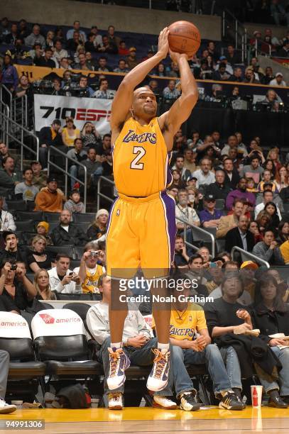 Derek Fisher of the Los Angeles Lakers shoots a jumper during the game against the Minnesota Timberwolves on December 11, 2009 at Staples Center in...