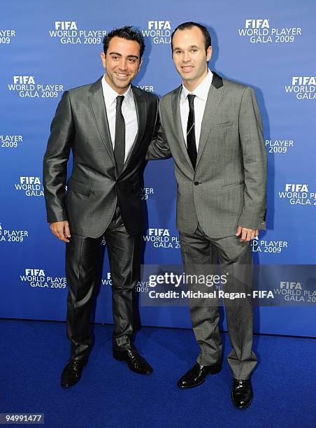Xavi poses with Andres Iniesta as they arrive at the FIFA World Player Gala on December 21, 2009 in Zurich, Switzerland.