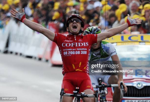 French Samuel Dumoulin jubilates on the finish line, on July 7 2008 in Nantes, after winning the 208 km third stage of the 2008 Tour de France...