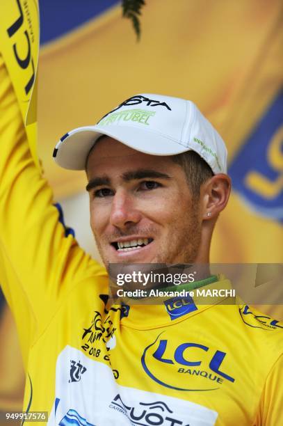 French Romain Feillu jubilates on the podium after winning the leader's yellow jersey, on July 7 2008 in Nantes, at the end of the 208 km third stage...