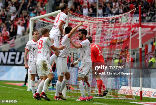 Robin Bormuth of Duesseldorf celebrates the third goal with his team mates during the Second Bundesliga match between Fortuna Duesseldorf and FC...