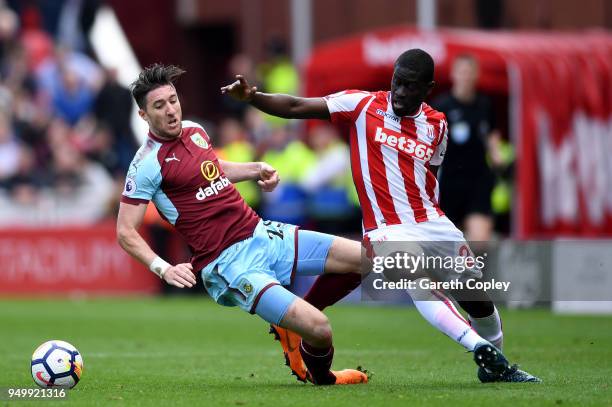 Stephen Ward of Burnley and Konstantinos Stafylidis of Stoke City in action during the Premier League match between Stoke City and Burnley at Bet365...