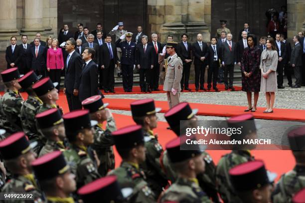 President Barack Obama and first lady Michelle Obama take part in a welcoming ceremony with France's President Nicolas Sarkozy and France's first...