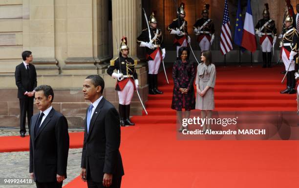 President Barack Obama with France's President Nicolas Sarkozy, US first lady Michelle Obama and France's first lady Carla Bruni-Sarkozy.