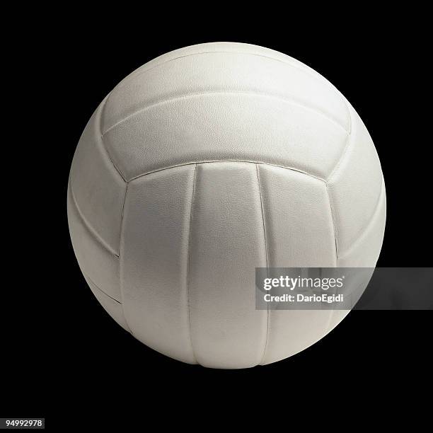 blanco al aire libre sobre fondo negro - volleyball fotografías e imágenes de stock