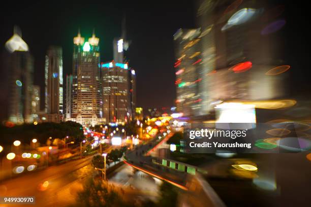 car traffic at night. motion blurred background.shanghai city,china - thruway stockfoto's en -beelden