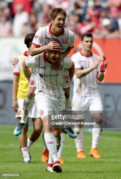 Genki Haraguchi and Robin Bormuth of Duesseldorf celebrate after the Second Bundesliga match between Fortuna Duesseldorf and FC Ingolstadt 04 at...
