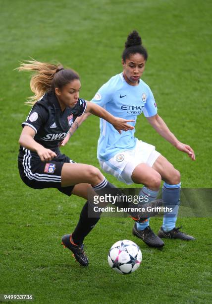 Delphine Cascarino of Lyon and Demi Stokes of Manchester City Women battle for the ball during the UEFA Women's Champions League Semi Final, first...