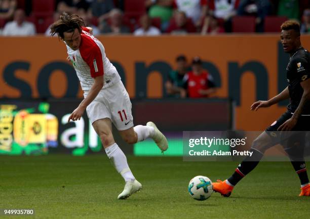 Michael Gregoritsch of Augsburg scores the opening goal during the Bundesliga match between FC Augsburg and 1. FSV Mainz 05 at WWK-Arena on April 22,...