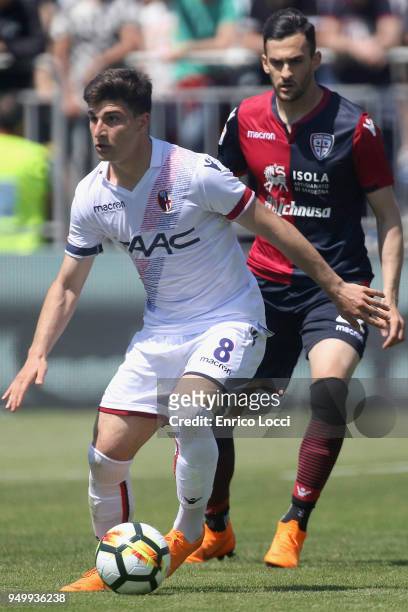 Riccardo Orsolini of Bologna in action during the serie A match between Cagliari Calcio and Bologna FC at Stadio Sant'Elia on April 22, 2018 in...