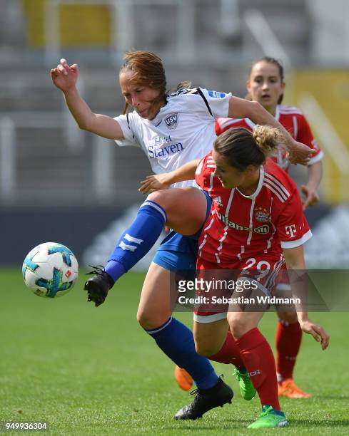 Sandra Zigic of Jena and Nicole Rolser of Bayern Muenchen compete for the ball during the Allianz Frauen Bundesliga match between FC Bayern Muenchen...