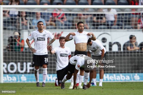 Marco Fabian of Frankfurt and team mates react after the Bundesliga match between Eintracht Frankfurt and Hertha BSC at Commerzbank-Arena on April...