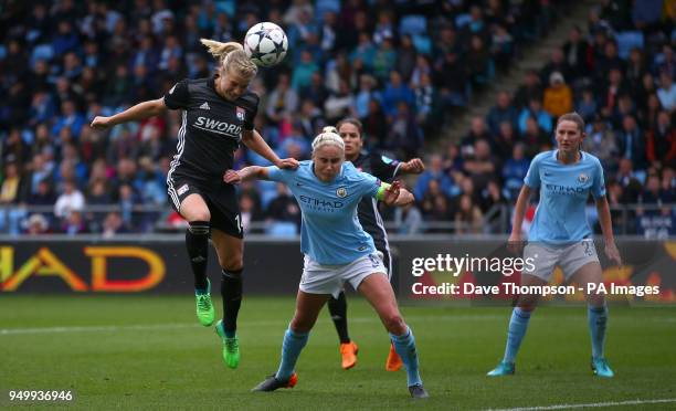 Lyon's Ada Hegerberg wins the ball ahead of Manchester City Womens' Steph Houghton during the UEFA Women's Champions League, Semi Final First Leg...