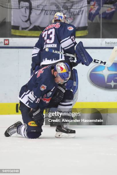 Jason Jaffray of Red Bull Munich looks dejected with his goalie Danny Aus den Birken after receiving the 4th goal during the DEL Playoff final match...