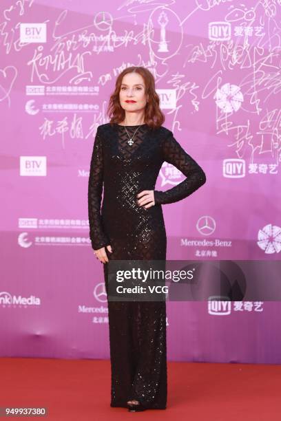 French actress Isabelle Huppert poses on red carpet of the closing ceremony of 2018 Beijing International Film Festival on April 22, 2018 in Beijing,...