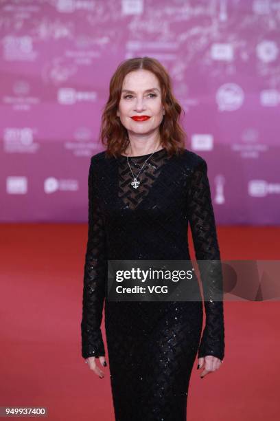 French actress Isabelle Huppert poses on red carpet of the closing ceremony of 2018 Beijing International Film Festival on April 22, 2018 in Beijing,...