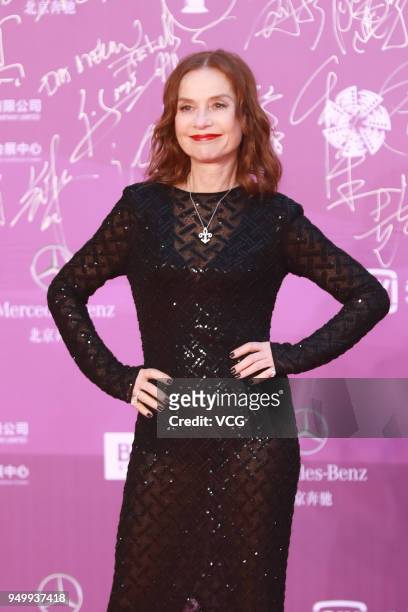French actress Isabelle Huppert poses on red carpet of the closing ceremony of 2018 Beijing International Film Festival on April 22, 2018 in Beijing,...