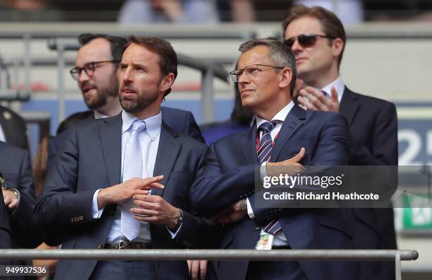 Gareth Southgate speaks to FA chief executive, Martin Glenn during the The Emirates FA Cup Semi Final match between Chelsea and Southampton at...