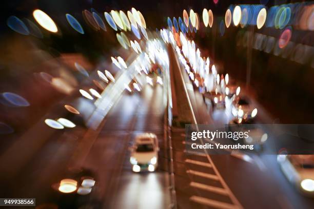 car traffic at night. motion blurred background.shanghai city,china - thruway stock-fotos und bilder