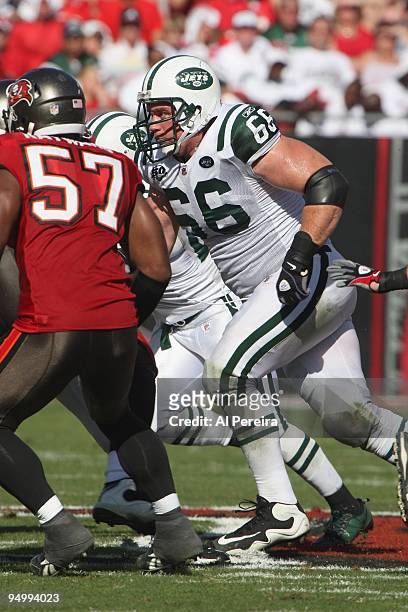 Guard Alan Faneca of the New York Jets blocks against the Tampa Bay Buccaneers when the Tampa Bay Buccaneers host the New York Jets at Raymond James...