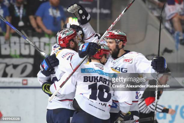 Andre Rankel of Eisbaeren Berlin celebrates scoring the 4th goal with his team mates during the DEL Playoff final match 5 between EHC Red Bull...
