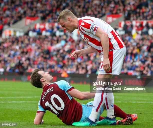 Burnley's Ashley Barnes has words with Stoke City's Ryan Shawcross during the Premier League match between Stoke City and Burnley at Bet365 Stadium...