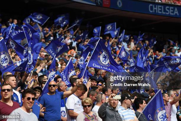 Chelsea fans wave flags during The Emirates FA Cup Semi Final match between Chelsea and Southampton at Wembley Stadium on April 22, 2018 in London,...